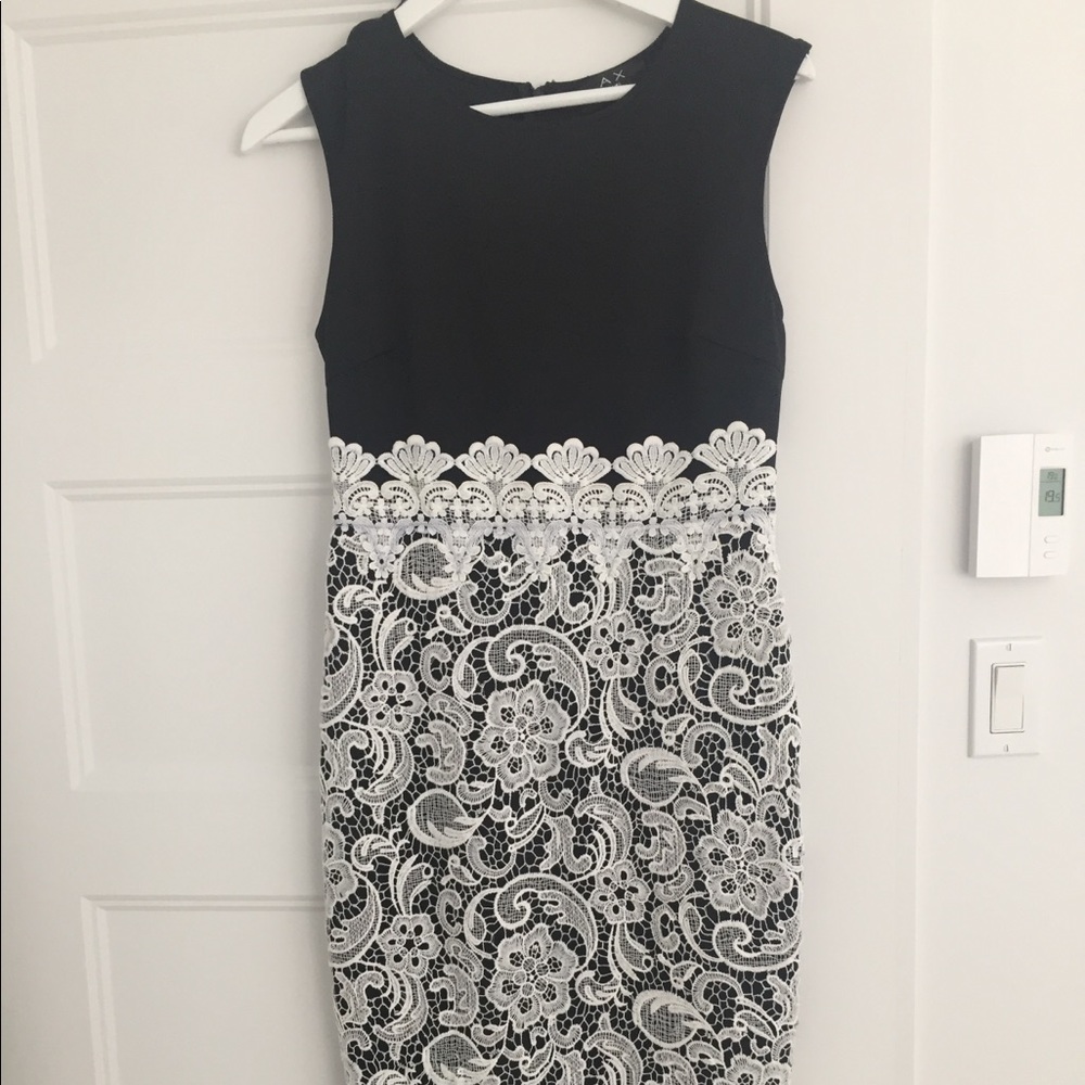 Black dress with lace skirt.